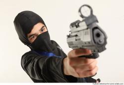 VLASTIMIL KNEELING POSE WITH GUN